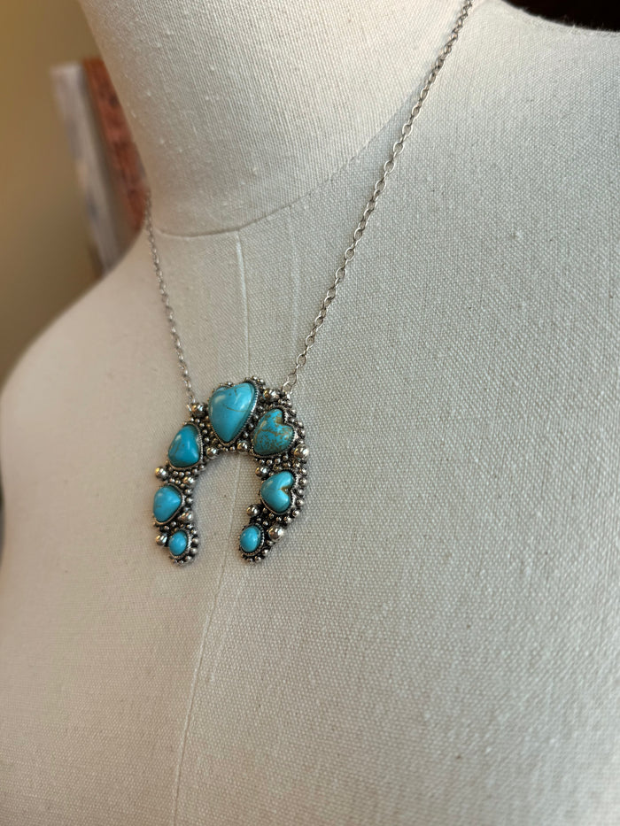 Turquoise heart squash pendant necklace, close-up on heart centerpiece