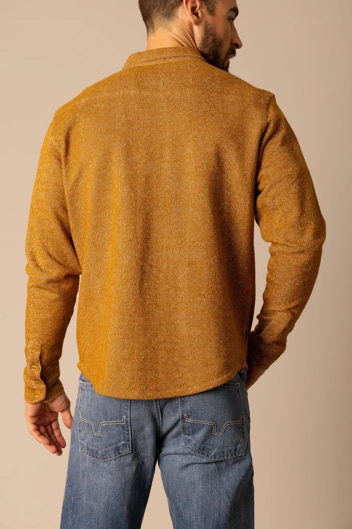 Mustard snap-front long-sleeve shirt, back view