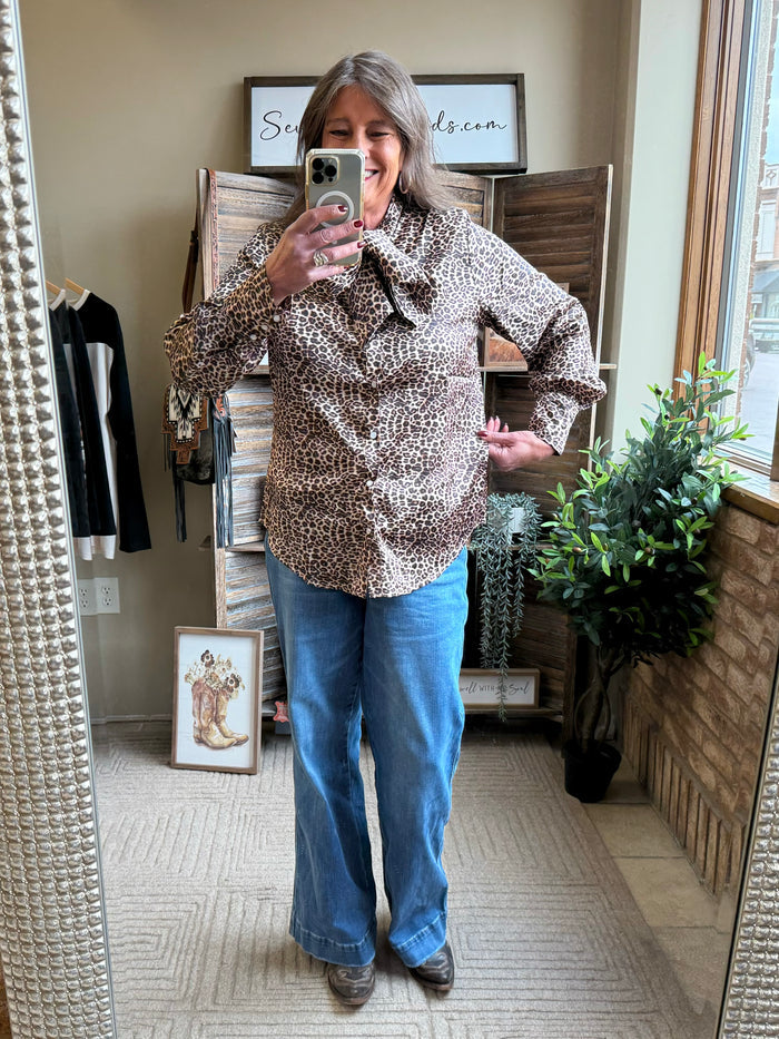 Leopard print bow tie blouse with puff sleeves and long cuffed cuffs