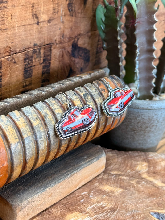 Red truck stud earrings with silver rope border and beaded edge, pair