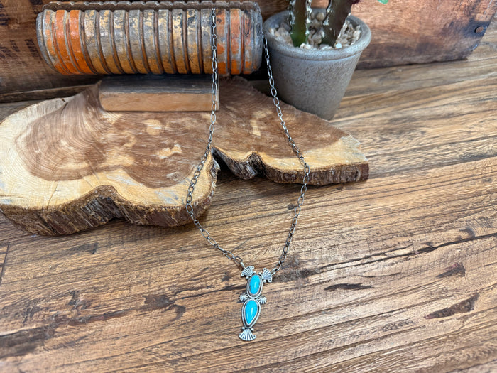 Turquoise and silver-tone beaded necklace with two oval cabochon pendants