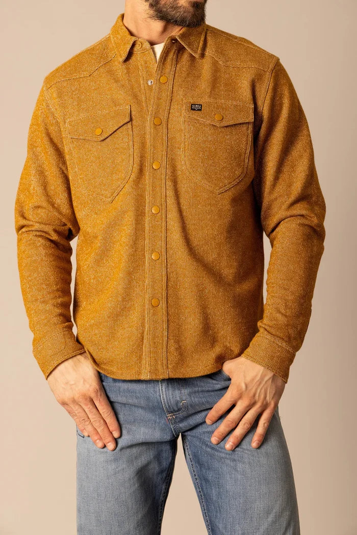 Mustard snap-front long-sleeve shirt with chest pockets and button placket