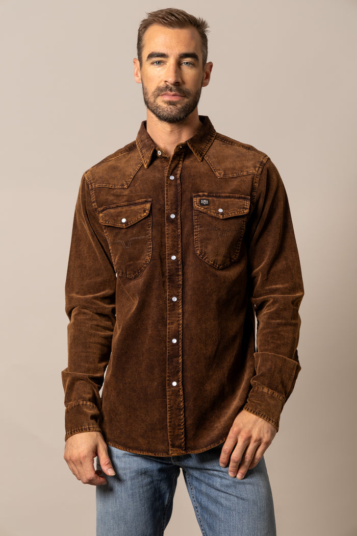 Dark brown corduroy shirt with button-front and two chest pockets, long sleeves