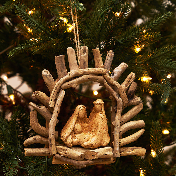 A Driftwood Manger with Arch Ornament.