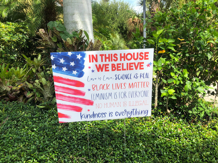 In this House yard sign