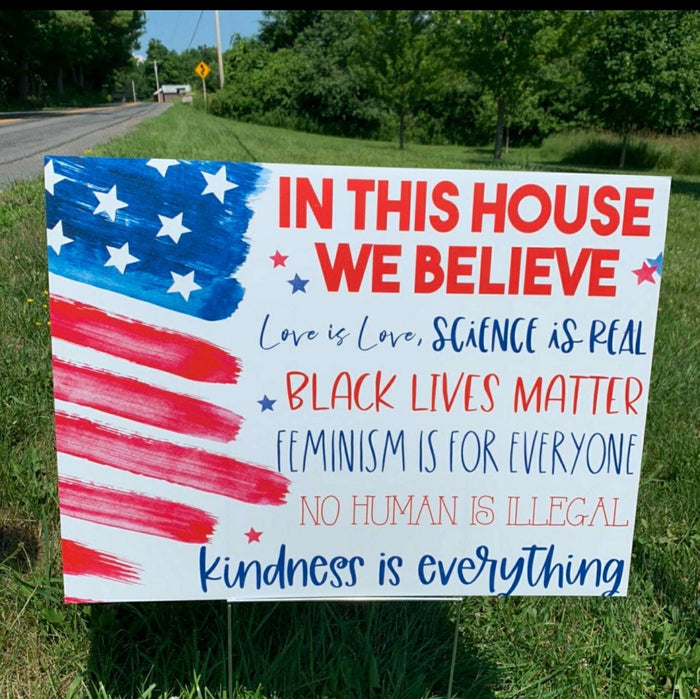In this House yard sign