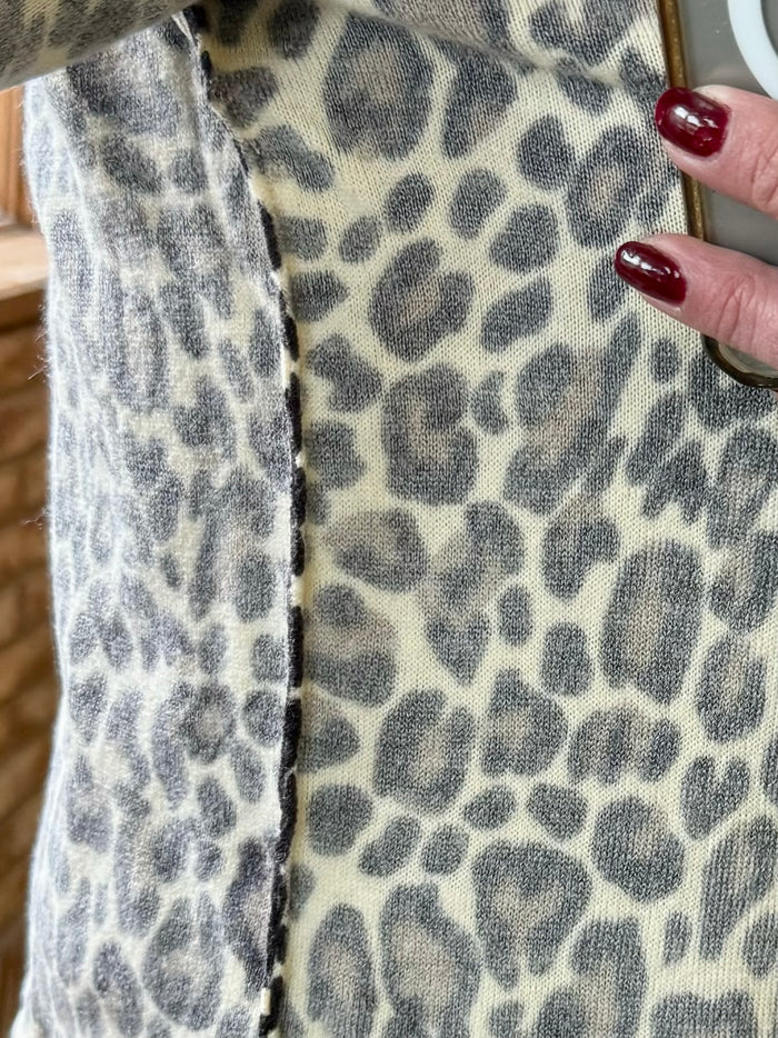 Leopard print cardigan front detail showing textured knit and open placket
