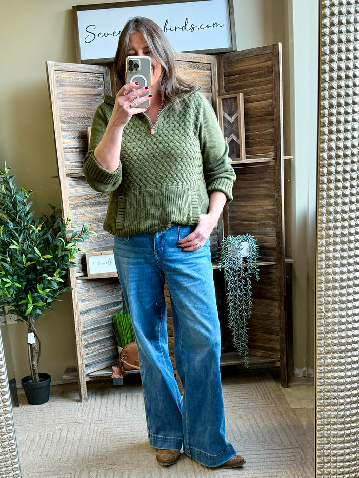 Olive green 1/4 zip cable knit sweater with split neckline and ribbed cuffs