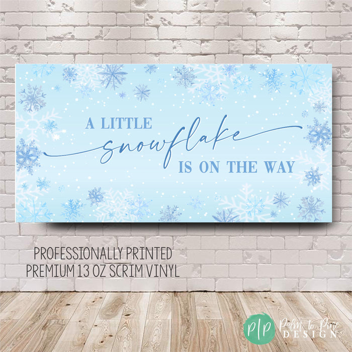 a little snowflake is on the way baby shower banner