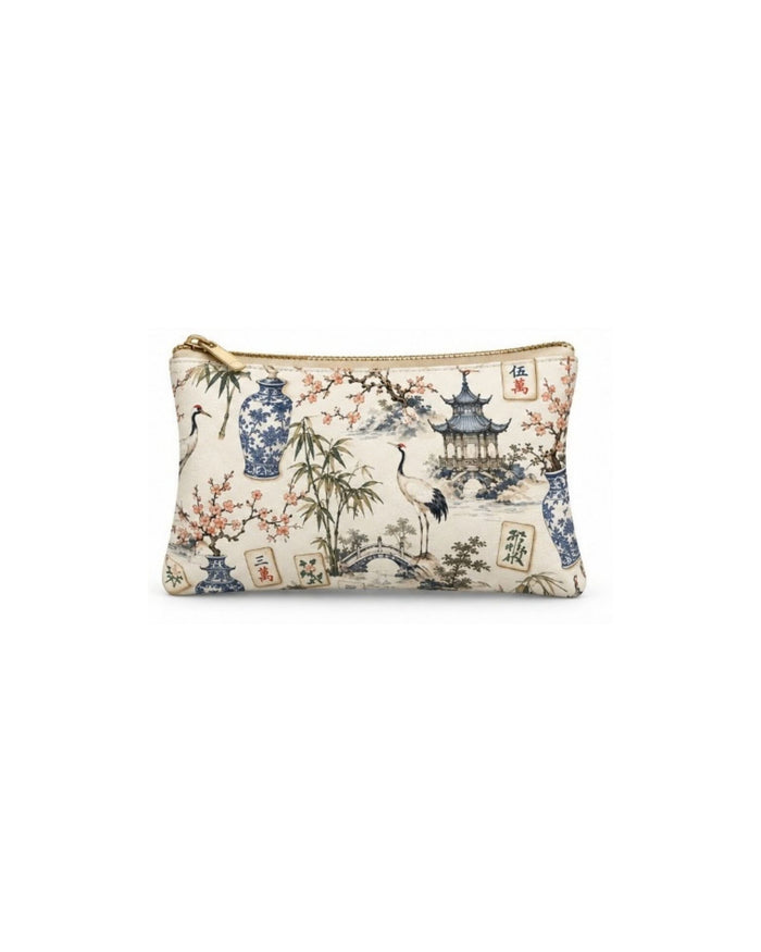 Printed vegan leather zippered pouch with gold-tone zipper, blue floral pagoda pattern
