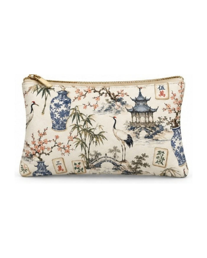 Printed vegan leather zippered pouch with gold-tone zipper, detailed bird and pagoda print