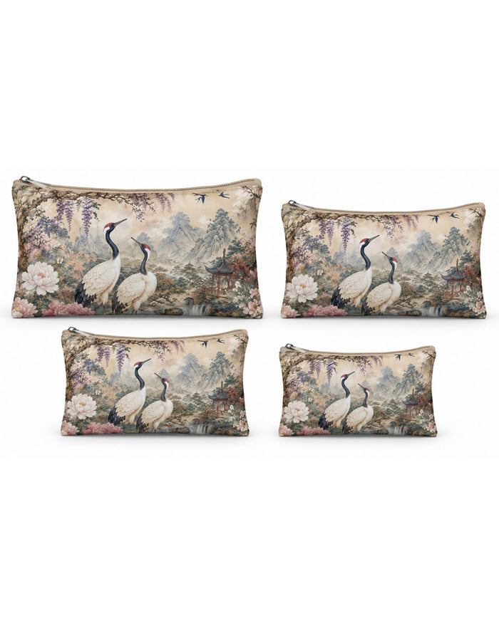 Four vegan leather zipper pouches in different sizes with bird floral print, set