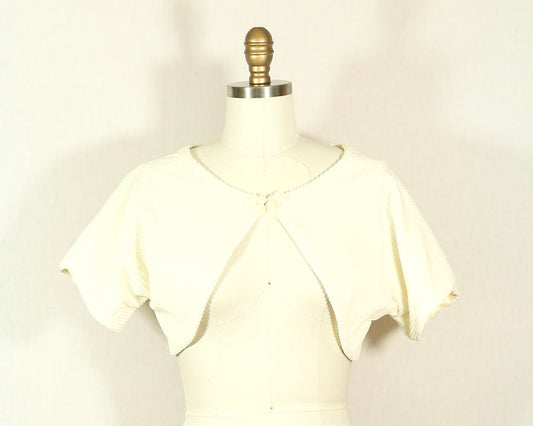 White Corduroy Shrug with Mother of Pearl Detail