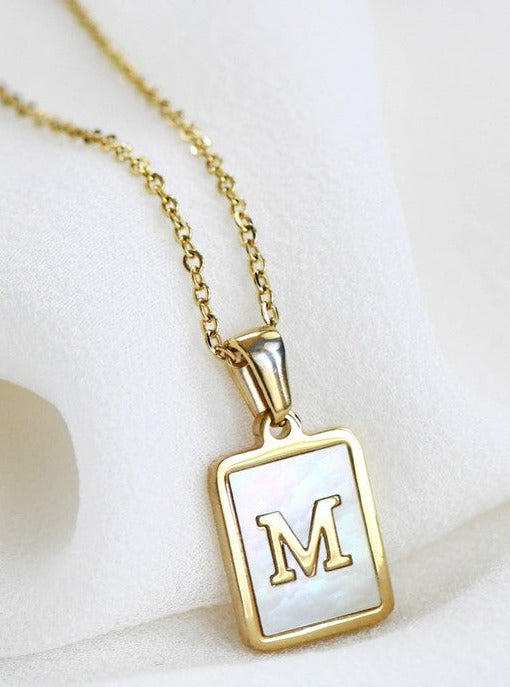 M / Gold